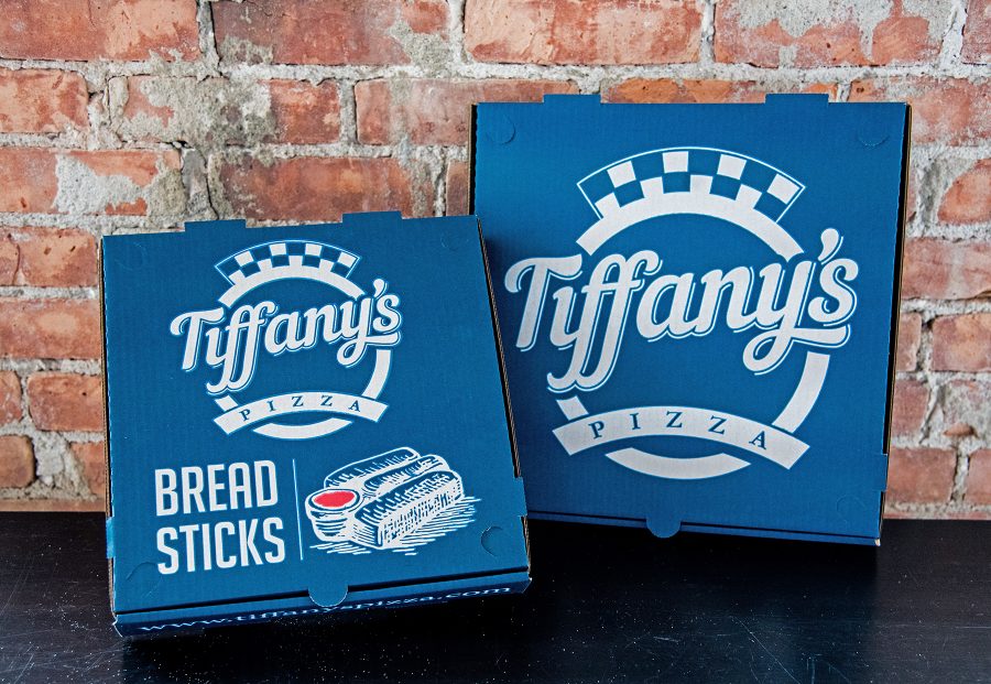Bright blue custom pizza box designs for Tiffany's Pizza and breadsticks.